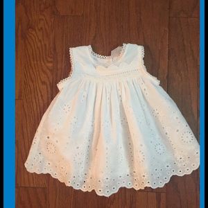 Beautiful white eyelet sundress fully lined. Large whited unattached sash